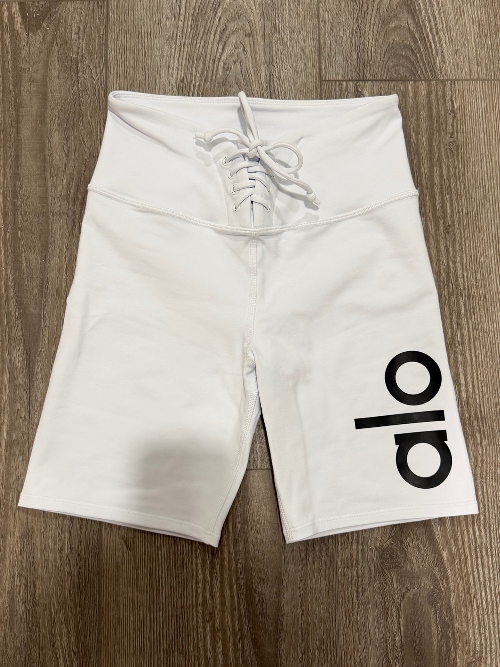 ALO Yoga White Lace-Up High-Rise Bike Shorts with Black Logo